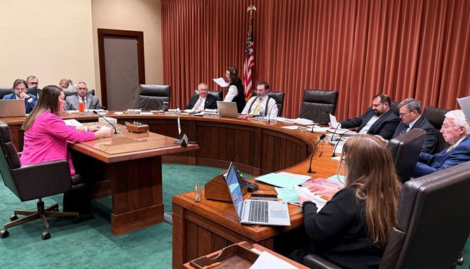 Jodi Eckhout (pictured above) and Drew Blossom (pictured below) testifying in support of LB718 before the Nebraska Legislature’s Banking Committee.