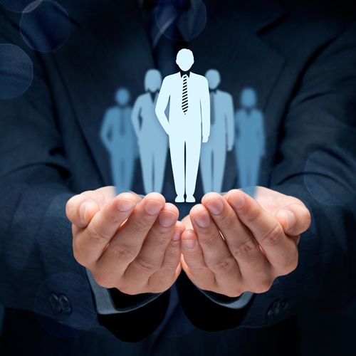 Welcome New Society Members; A person in a suit holds a glowing, transparent figure of a businessperson, symbolizing leadership and team management. Tone is confident and supportive.